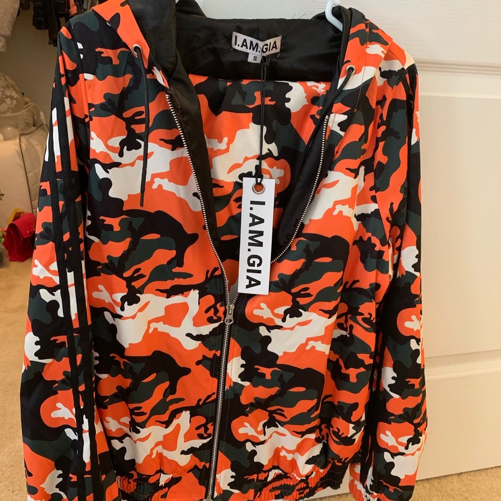 I.AM.GIA orange camo print track suit.